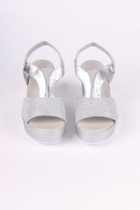 Silver glitter high heels on a white background
