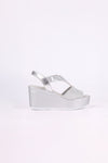 Silver wedge sandal on a white background