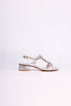 Silver low heels sandal with a decorative strap on a white background