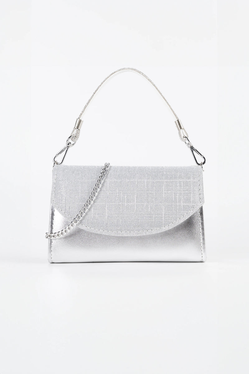 Stella Silver Metallic & Glitter Clutch. Italian vegan leather with 2 interchangeable straps: silver chain and glitter handle. Made in Italy.