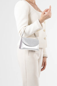 Stella Silver Metallic & Glitter Clutch. Italian vegan leather with 2 interchangeable straps: silver chain and glitter handle. Made in Italy.